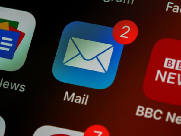 Email security icon with notification badge.