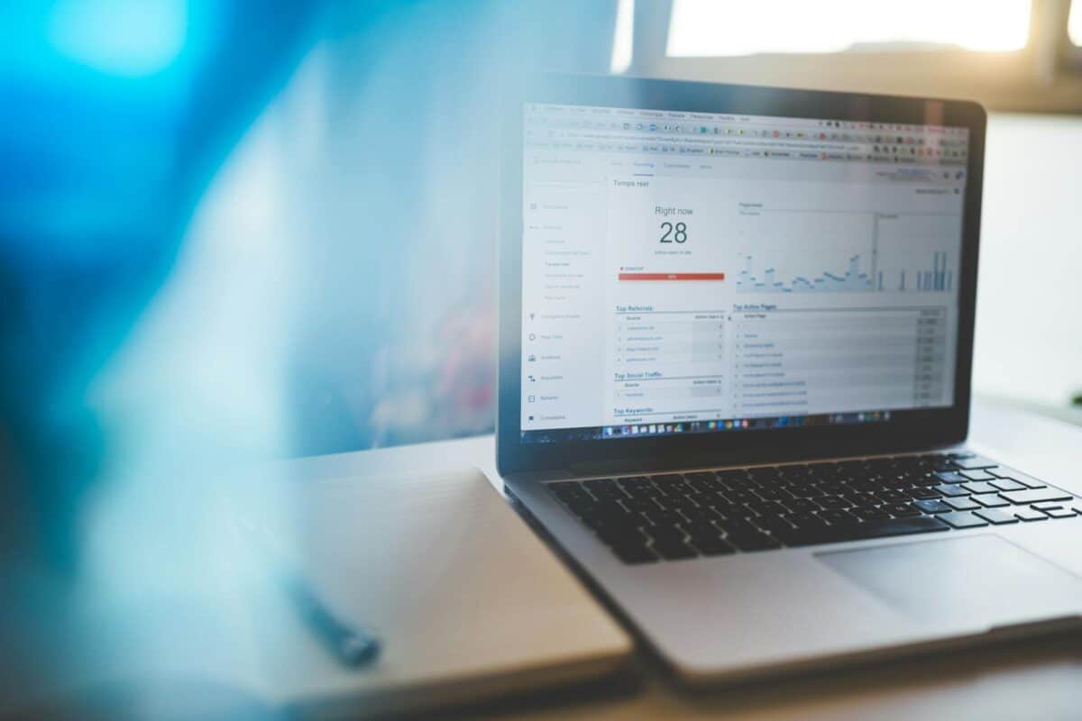 Digital marketing analytics on a laptop screen showing website performance data.